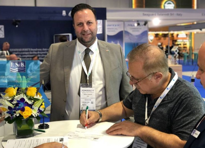 Panos Kirnidis, CEO of PISR with Jamal S Khalil, General Manager, of Al Rafedain Marine Services. (Photo: Palau International Ship Registry)