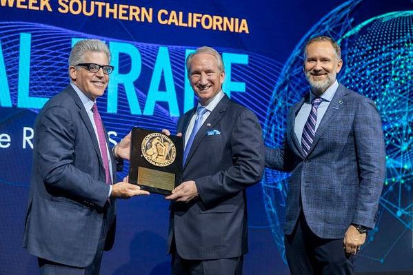 Port of Los Angeles Executive Director Gene Seroka, center, receives the Stanley T. Olafson Award from Los Angeles Area Chamber of Commerce President and CEO Mark Louchheim, left, and chamber Board Chairman A.G. Spanos.