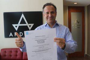 Ardent CEO, Peter Pietka displays the ISO 9001:2015 certificate from Lloyd’s Register Quality Assurance. (Photo: Ardent)