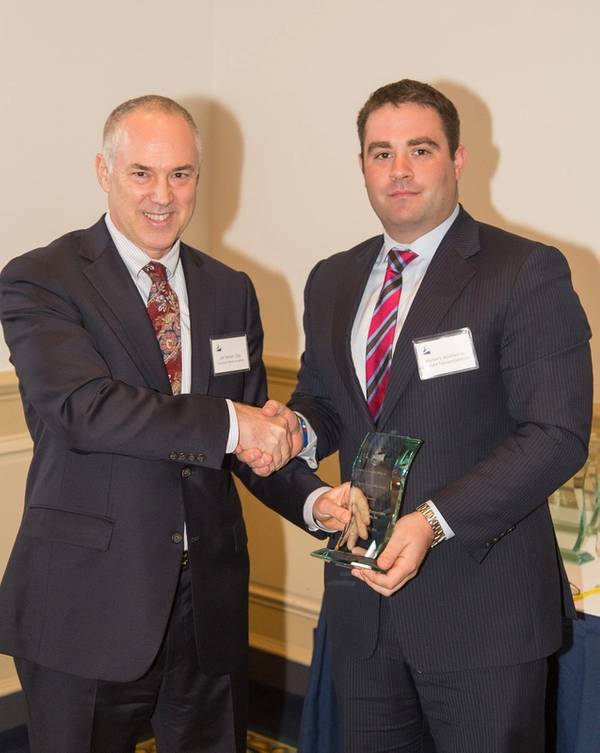 Bouchard Transportation Co., Inc. Vice President of Operations & Sales Morty Bouchard IV accepts the AMS Tug & Barge Safety Award from AMS President Lee Seham at the American Maritime Safety 25th Annual Membership Meeting on Thursday, October 23, 2014 (Photo: AMS)