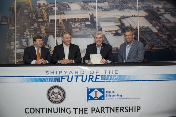Gov. Phil Bryant (third from left) participates in the ceremonial signing of the “Shipyard of the Future” bill at Ingalls Shipbuilding, along with (left to right) Lt. Gov. Tate Reeves, Ingalls Shipbuilding President Brian Cuccias and Mississippi House Speaker Philip Gunn. (Photo: Andrew Young/HII)