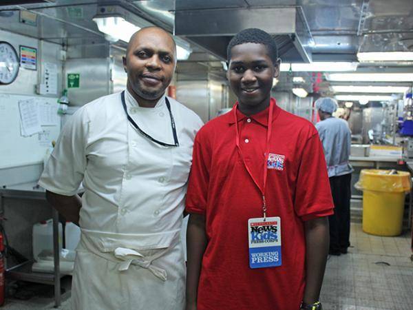 Caleb and chef Serge Nzembele in the galley of Africa Mercy, a floating hospital. (Photo courtesy of Caleb Biney)