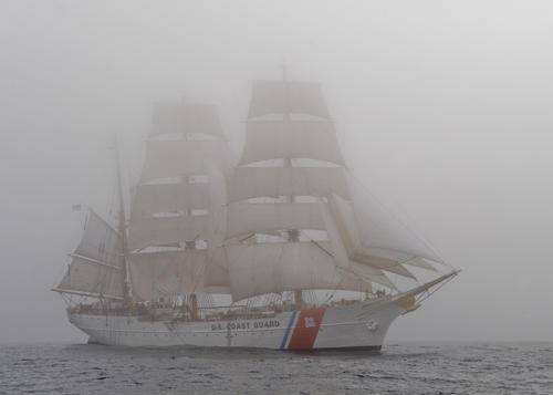 The Coast Guard Cutter Eagle sails through dense fog. U.S. Coast Guard photo by Petty Officer 2nd Class Erik Swanson.