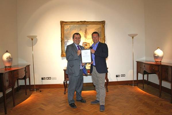 Nick Davis, CEO of GoAGT, receiving ISO/PAS 28007 certificate from David Derrick, LRQA’s UK Business Centre Manager.
