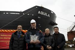 Delivery of M.V. Aquila: Left to right: Mr. Zhuang Tian, LR Surveyor in Charge Nantong; Master - M/V Aquila; Mr. Tae-Bok Kwak, LR Project Manager; Mr. Xiaofeng Yang, LR Site Office Team Leader.