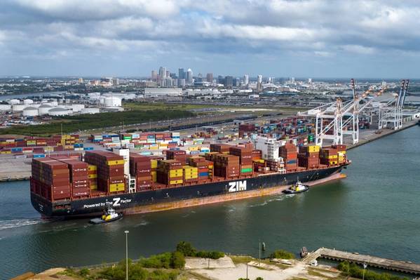 With downtown Tampa as its backdrop, the ZIM Canada arrives carrying 11,900 twenty-foot equivalent units (TEUs) — the highest capacity ever handled at Port Tampa Bay. © Port Tampa Bay