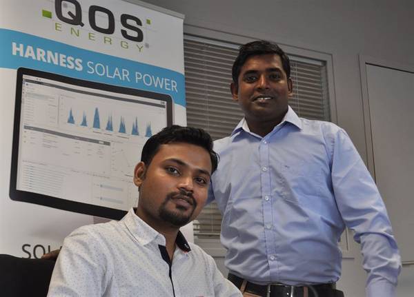 QOS Energy project Engineers Navdej SINGH and Shankar KUMAR. (Photo: QOS Energy)