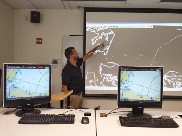 BCG engineer Jason Zilbauer conducts training with the Naval Academy instructors who will use the software (Photo: BCG)