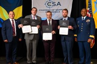 Garrett Huffman, Chairman, Chamber of Shipping of America; Captain Nick St. Jean, Crowley; Chief Engineer Dimiter Mitev, Crowley; Captain Kevin Wood, Crowley; Rear Admiral Will E. Watson, Heartland District, U.S. Coast Guard. Credit: Crowley