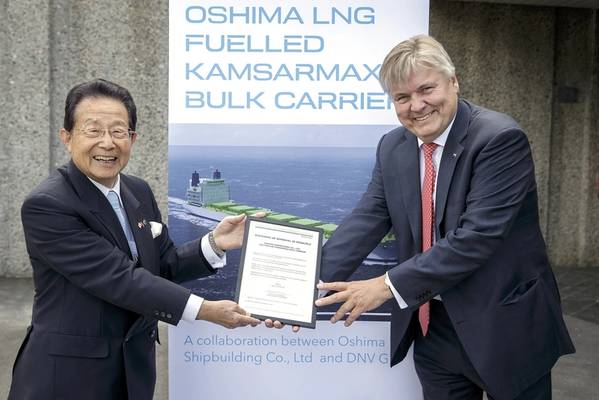 DNV GL Group President & CEO Dr Henrik O. Madsen (right) presents the CEO of Oshima Shipbuilding, Sho Minami, with the AiP certificate for the Japanese yard’s LNG-fuelled Kamsarmax bulk carrier design