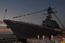 The guided-missile destroyer USS Spruance (DDG 111) is commissioned during a sunset ceremony at Naval Air Station Key West, Fla. (U.S. Navy photo by Mass Communication Specialist 2nd Class Michael K. McNabb/Released)