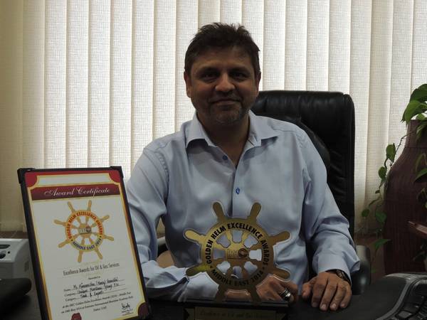 CEO Harry Gandhi with the Award and Certificate