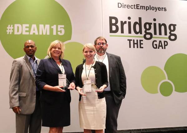 Ingalls Shipbuilding employees (left to right) Carlos Lett, Angela Woodruff, Sidni Wafler and Fred Howell accept two awards on behalf of the shipyard’s Talent Acquisitions team at this year’s DirectEmployers Annual Meeting and Conference. Ingalls won the overall award for VEVRAA compliance initiatives and the runner-up award for recruitment marketing campaigns. Photo courtesy of DirectEmployers