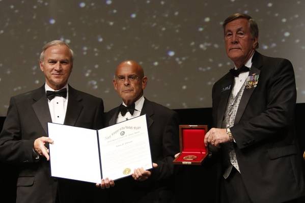 Irwin F. Edenzon (center) accepts the Fleet Admiral Chester W. Nimitz Award from Rep. Randy Forbes (left) and James H. Offutt, national president of the Navy League of the United States, Tuesday night in National Harbor, Maryland. Photo courtesy of the Navy League of the United States