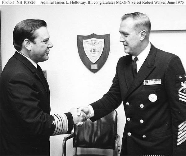 Adm. James L. Holloway III congratulates Master Chief Petty Officer of the Navy Robert Walker, June 1975. (U.S. Navy photo)