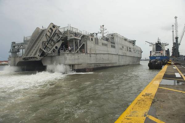In 2014 the joint high-speed vessel USNS Spearhead (JHSV-1) maneuvers alongside the pier in Lagos, Nigeria. Spearhead took part in Obangame Express, a multinational at-sea exercise designed to improve cooperation among participating nations in order to increase counter-piracy capabilities. (U.S. Navy photo by Mass Communication Specialist Seaman Weston Jones/Released)
