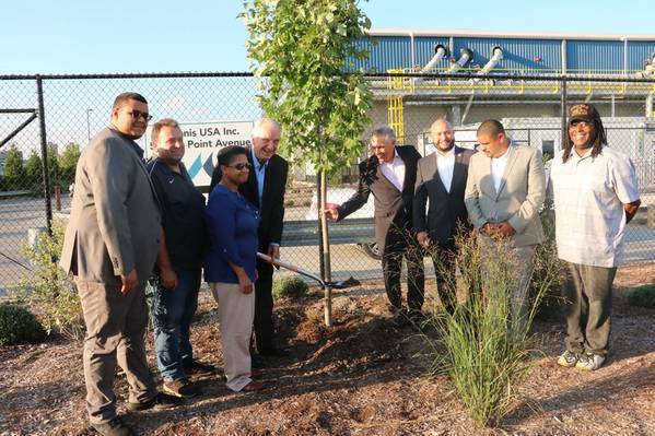 McInnis Cement plants a maple tree with officials and members of community organizations to celebrate the opening of the company’s new terminal. From left to right: Ramon Cabral, Deputy District Director; Nick Madio, Bronx Community Board 2; Maria Torres, President & COO, The Point; Laurent Beaudoin, Chairman, McInnis Cement; Jean Moreau, President and CEO, McInnis Cement; Rafael Salamanca, Councilman & Chair of the Land Use Committee; Ralph Acevedo, District Manager, Bronx Community Board 2; an