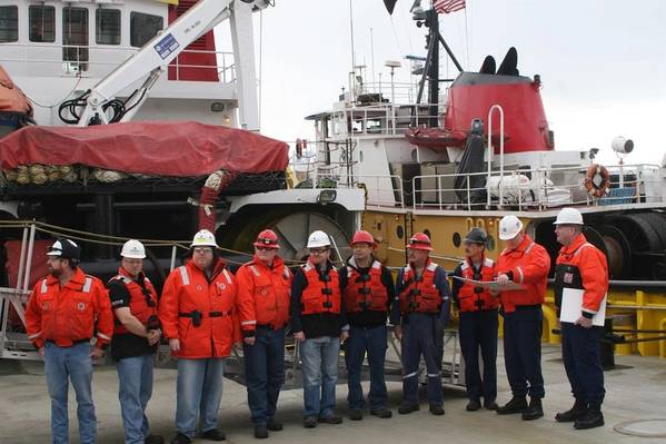 Crew members of Crowley's tugboat Alert receiving USCG commendation (Photo: Crowley)