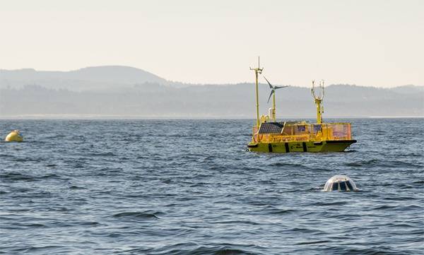 Ocean Sentinel wave energy testing system off Newport: Photo courtesy of NOAA/Pat Kight, Ore. Sea Grant