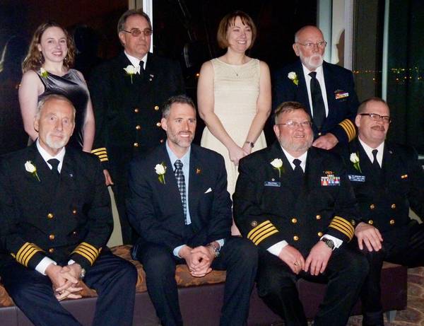 2015 officers of the International Ship Masters’ Association:  (front row, l to r) Grand Secretary-Treasurer Al Tielke, Grand 2nd Vice President Lee Barnhill, Grand President Joe Walters, Grand 1st Vice President Bob Lund; (back row, l to r) Grand Warden Caitlin Clyne, Grand Marshal Harry Dusseau, Grand Sentinel Amy Seeley, Grand Chaplain Bob Libby.  Photo taken at Duluth, MN, February 6, 2015.