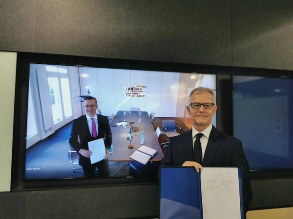 Pictured are Christian Rychly (on screen; left), Managing Director of MPC Capital – in Hamburg, and Carl Schou, CEO & President of Wilhelmsen Ship Management – in Singapore, taken during an online signing ceremony to formalize the partnership. (Photo: Wilhelmsen Ship Management)