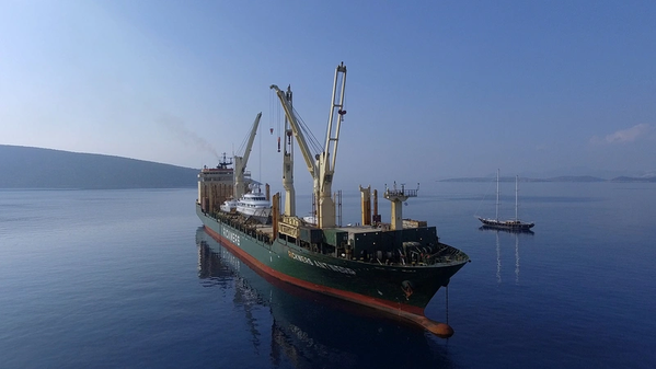 “RICKMERS ANTWERP is one of nine identical sister vessels employed in the Rickmers-Line Round-The-World Pearl String Service. She is here pictured loading yachts in Bodrum, Turkey.” Photo: Rickmers-Line