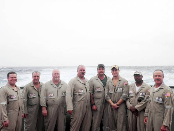left to right: Alan Williams, AB; Doug Carson, third mate; Pat McGee, cook; Ron Robinson, chief mate; Chris Farmer, AB/tankerman; Vince Mull, chief engineer; Travis Stringer, AB/tankerman, and  Gus Cramer, captain.