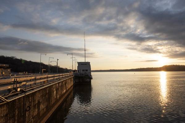 The sun rises Jan. 5, 2022 over Chickamauga Lock on the Tennessee River in Chattanooga, Tennessee, which is operated and maintained by the U.S. Army Corps of Engineers Nashville District. (USACE Photo by Leon Roberts)