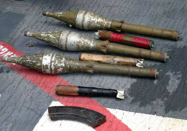 Rocket propelled grenades (RPGs) and other armaments lay on the deck of USS Cape St. George (CG 71) after being confiscated during an early-morning engagement with suspected pirates. Cape St. George and USS Gonzalez (DDG 66) were fired upon while preparing to board a suspect vessel operating in international waters off the coast of Somalia. One suspect was killed and 12 were taken into custody. Coalition forces conduct maritime security operations to ensure security and safety in international w