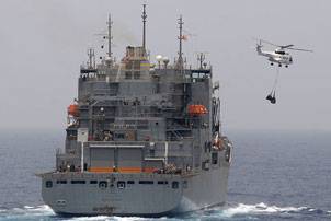 An SA-330J Puma helicopter carries supplies to the amphibious dock landing ship USS Ashland (LSD 48) during a vertical replenishment. Ashland is part of the Nassau Amphibious Ready Group supporting maritime security operations and theater security cooperation operations in the U.S. 5th Fleet area of responsibility. (U.S. Navy photo by Mass Communication Specialist 2nd Class Jason R. Zalasky/Released)