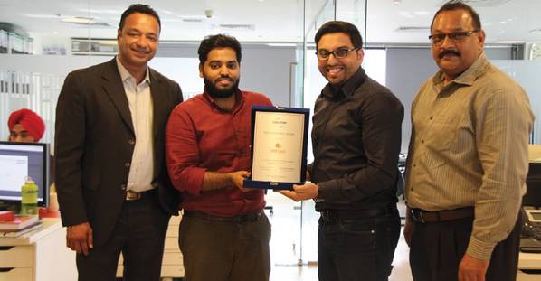 Al Sharqi directors Atif and Asif Rafiq with the CMA CGM commercial manager Santhosh Devasper and regional export trade manager Manoj Kumar (Photo: Al Sharqi Shippping)
