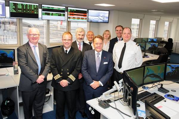 Shipping Minister John Hayes CBE MP (front row, third from left) at ABP Southampton with James Cooper, chief executive at Associated British Ports (front row, far left), Alastair Welch, port director at ABP Southampton port director (back row, far right) with staff at ABP Southampton (Photo: ABP)
