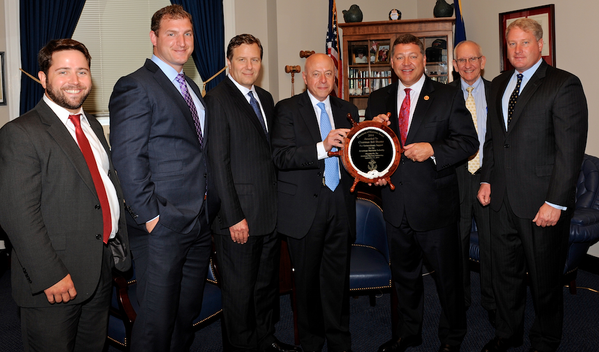 Rep. Bill Shuster is presented with the Champion of Maritime Award from the American Maritime Partnership.   L to R: Ben Billings, President, Offshore Marine Service Association; Stephen Martinko, Executive Director at Port of Pittsburgh Commission; Dave Grzebinski, President and CEO, Kirby Corporation; Thomas Allegretti, AMP Chairman and President and CEO American Waterways Operators; Rep. Bill Shuster; Barry Holliday, Executive Director for the Dredging Contractors of America; Matthew Paxton, 