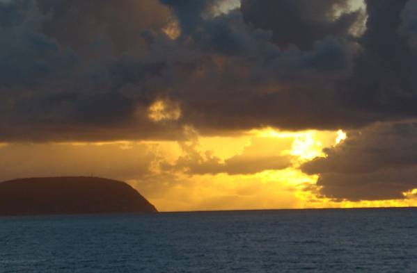 Sunrise off of Oahu. (Photo: Greg Trauthwein)