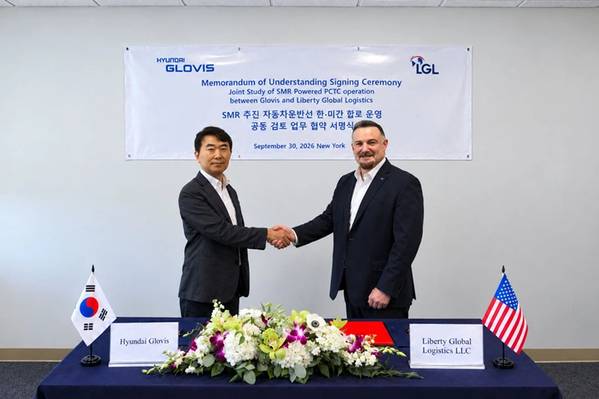 Kim Tae-Woo, Hyundai Glovis Co., Ltd, David Minetti, Liberty Global Logistics LLC. Photo courtesy LGL
