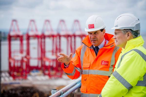 Transport Minister Andrew Jones (right) with Warren Marshall, Group Planning Director at Peel Ports, overlooking the port (Photo: Peel Ports Group)
