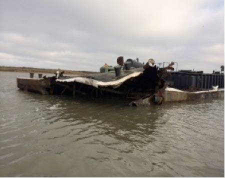 Barge collison damage: Photo courtesy of USCG