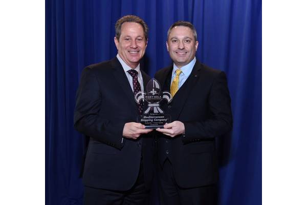 Bobby Landry, Port NOLA VP of Commercial, presents an award to Fabio Santucci, MSC, at the 2018 Cargo Connections Conference. (Photo: Port NOLA)