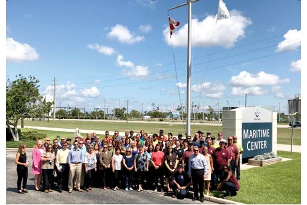 Port Canaveral staff gather to for flag raising. (Canaveral Port Authority)