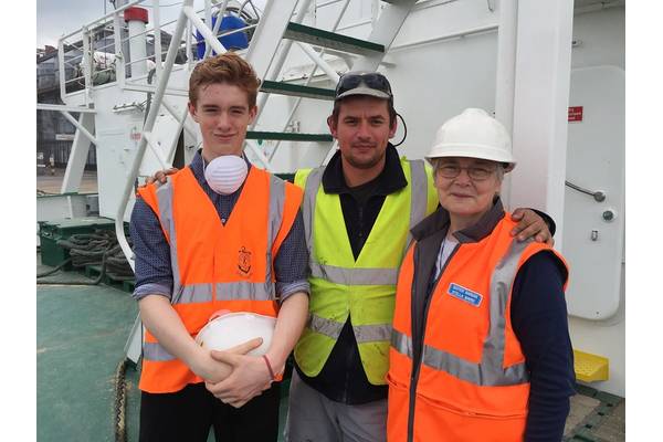 Max Charlton who spent two weeks on work placement with AoS visits the grain ship mv Arklow Raven at Ipswich port. With him is seafarers Marcin and Sr Marian Davey, AoS port chaplain in Ipswich. (Photo: AoS)