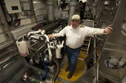 Chief Engineer David Wright in one of this two identical engine rooms. (Source: Alan Haig-Brown)