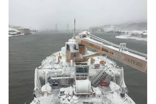 The Coast Guard Cutter Alder approaches the Portage Lake Lift Bridge in Houghton, Mich., Dec. 16, 2016. The Alder and other Great Lakes Coast Guard cutters commenced Operation Taconite, the Coast Guard’s largest domestic ice-breaking operation, encompassing Lake Superior, the St. Mary’s River, the Straits of Mackinac and Lake Michigan, Dec. 19, 2016. (U.S. Coast Guard photo)