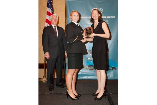Crowley's Victoria Ellis presents the scholarship award to Bonnie Muchnick at the Connie Awards dinner in Long Beach, Calif.