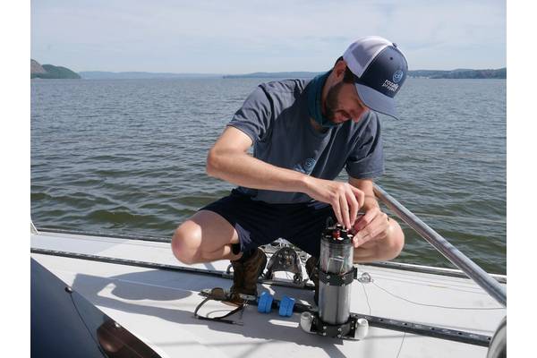 Ethan Edson of Ocean Diagnostics demonstrates some of his microplastic sensors. Credit: Ocean Diagnostics.