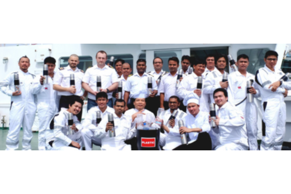 Godavari Spirit crew showing off the new water bottles (Photo: Teekay)