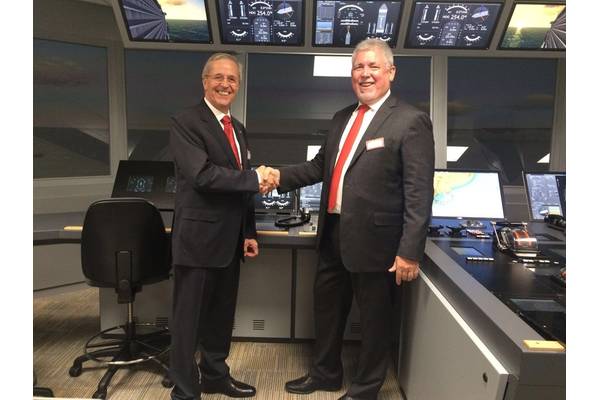 Capt. Hans Hederström, Managing Director of the CSMART and Frank Coles, Transas CEO at the CSMART / Arison Maritime Center Opening (Photo: Transas)