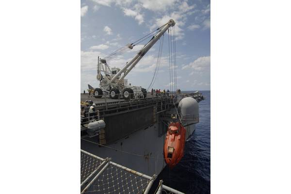 The lifeboat from the Maersk Alabama is hoisted aboard the USS Boxer to be processed for evidence after Phillips’ rescue. (U.S. Navy photo by Jon Rasmussen)