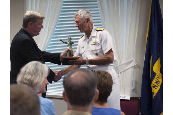 Adm. Sam Locklear accepts the "Old Salt" award from Surface Navy Association President, Vice Ad. Barry McCullough, USN, Ret., during a ceremony at the Pentagon in Washington, D.C. Locklear was the 18th recipient of the "Old Salt" award, presented to the longest serving surface warfare officer on continuous active duty. (US Navy photo by Tyrell K. Morris)