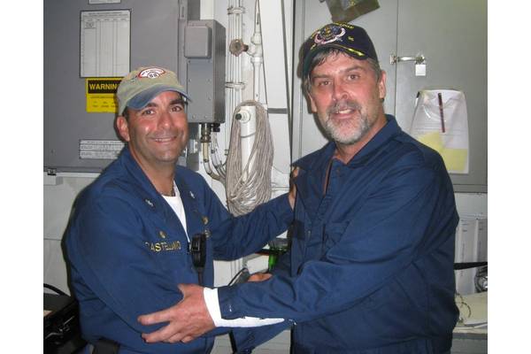 Maersk-Alabama Capt. Richard Phillips, right, stands alongside Cmdr. Frank Castellano, commanding officer of USS Bainbridge after being rescued by U.S Naval Forces off the coast of Somalia. (Official U.S. Navy photo)
