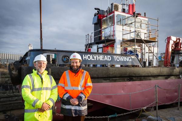 Operations director Kevin Lewis and Captain Mark Meade, chairman of Mustang Marine, alongside the multipurpose workboat Llanddwyn Island, which recently underwent a £250,000 refit at the Pembroke Dock workboat and marine renewable energy device builder (Photo courtesy of Mustang Marine)